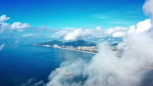 Aerial Top view of a transparent blue sea with beautiful waves at sunny day in summer. air of ocean