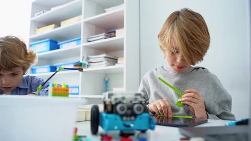 Robotics Programming Class Children Construct and Code Robot STEM Education Using Constructor