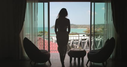 Woman Elegance Walking on Balcony Enjoy Ocean View