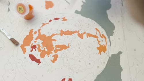 Canvas paintings with areas numbered, for certain colors. close-up.