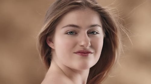 Beautiful Blonde Woman Gently Touching Neck