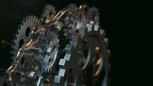 Close Up of Intricate Silver Gears Turning