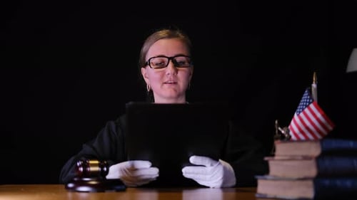 Female Judge Reading the Verdict in American Court