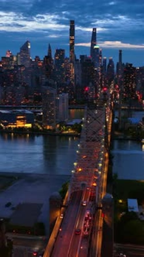 Stunning cityscape of New York in the lights. Spectacular Queensboro Bridge over East River