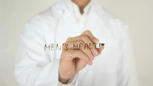Doctor Writing Men's Health Message on Clear Surface