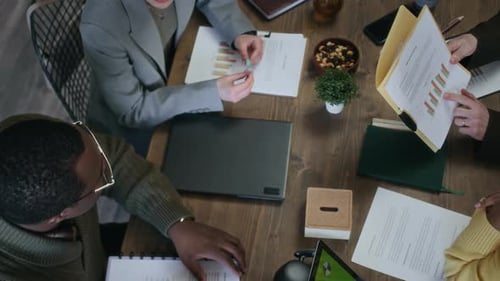 Group of Young Creative Multiethnic Team Coworking in Modern Office