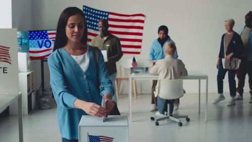 Portrait of Beautiful Caucasian Woman Casting Ballot in State Referendum