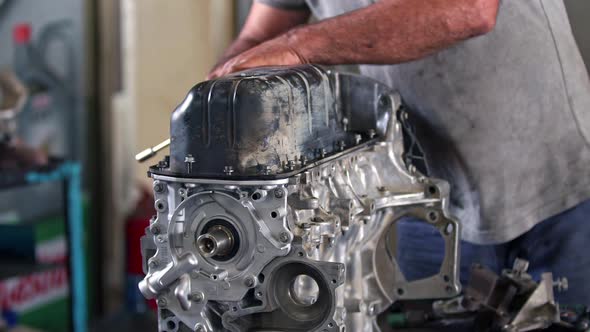 Assembling And Repairing The Troubleshooted Car Engine With Screws In ...