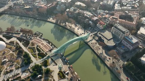 Drone View of the Bridge of Peace and Tbilisi Riverfront