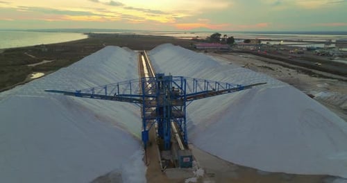 Aerial View of a Salt Flat Factory Besides the Sea Salt Extraction