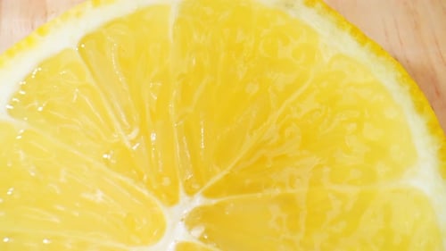 Bright Yellow Lemon Slice Close-Up