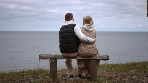 A Couple Enjoying a Beautiful and Romantic Moment Together By the Ocean at Sunset