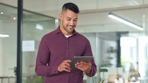 Smiling Busy Young Business Man Manager Using Tablet Standing in Office