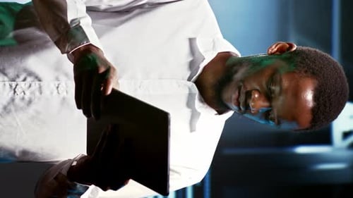 Vertical Video Electrician Inspecting Server Hub