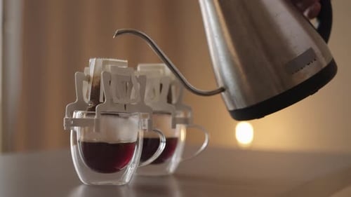 Pouring Hot Water into Pour Over Coffee