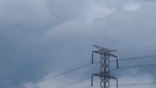 Towering Electricity Pylon against a Gray Sky