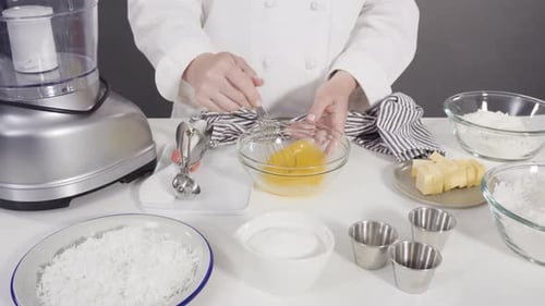 Time Lapse Mixing Ingredients in a Food Processor to Prepare Homemade Coconut Cookies
