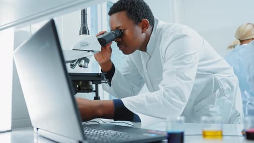 Scientist Analyzing Data in Modern Laboratory