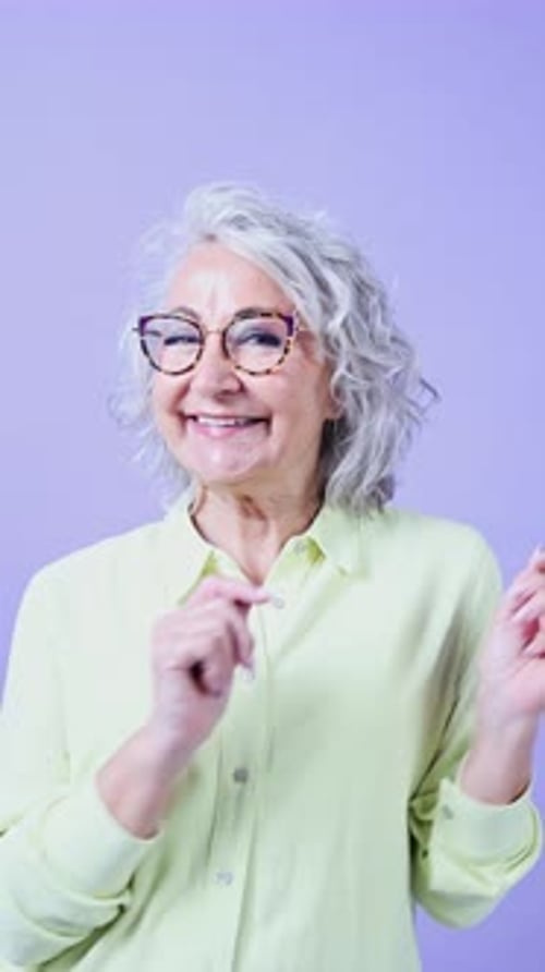 Senior Woman Dancing Happily with Positive Energy