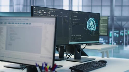 Close Up of Code on Computer Screens in Server Hub Used for AI Data Processing