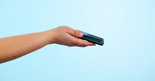 Customer, hands and credit card on pos machine for payment, purchase or buying against a studio