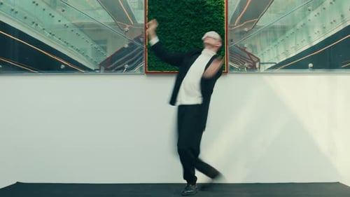 Office Worker in Blindfold Dancing at Workplace