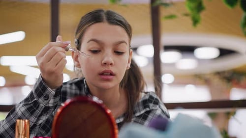 Teen Applies Facial Serum for Skincare Routine