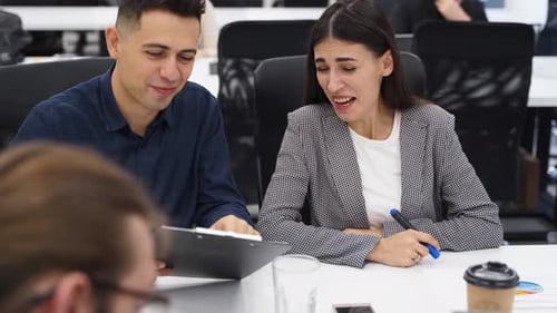 Group of Office Employees Sit and Discuss on Startup Project in Conference Room Team of Business