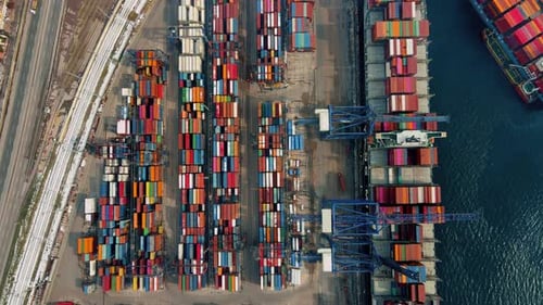 Aerial View of Busy Container Port and Cargo Ships