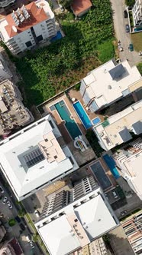 Vertical Video FamilyFriendly Pool Area with Exciting Slides for Kids and Relaxing for Adults