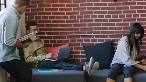 Startup teamwork, creative portfolio and documents collaboration with marketing people in meeting