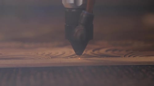 Laser Cutter Precisely Carving Intricate Patterns