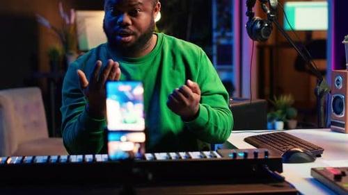 Music Maker Working in his Studio