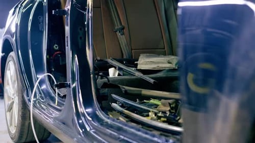 Closeup of a Disassembled Part of a Car Before a Complete Repair After an Accident at Service