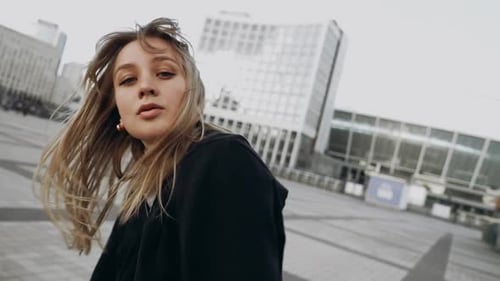 Young Woman Dancing Hip Hop on the Street