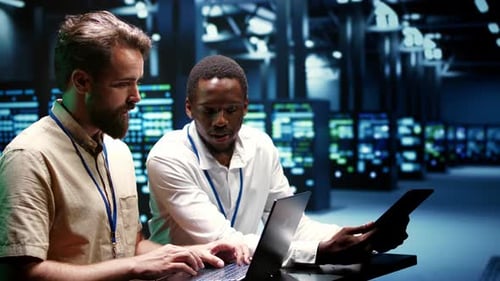 Colleagues Running Data Center Tests