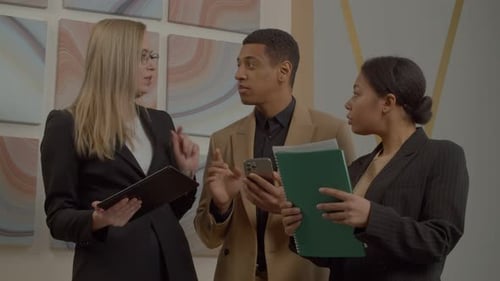 Successful Diverse Multiracial Coworkers Working on Business Project at Office
