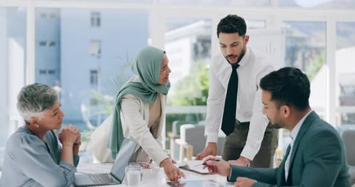 Diverse Team Collaboration During Business Meeting