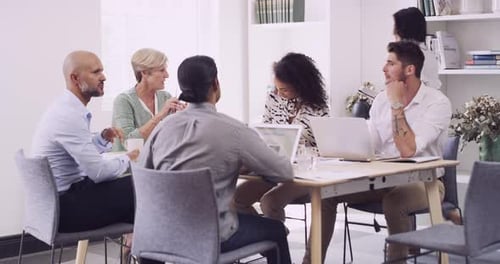 4k video footage of a group of businesspeople having a meeting in a modern office