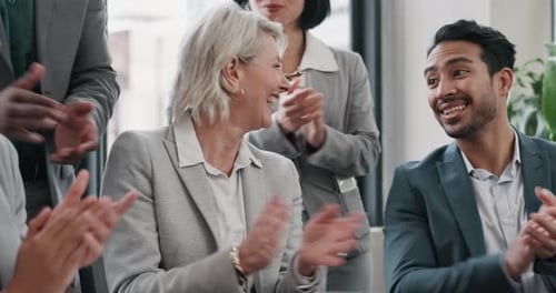 Diverse Group Applauds at Business Meeting