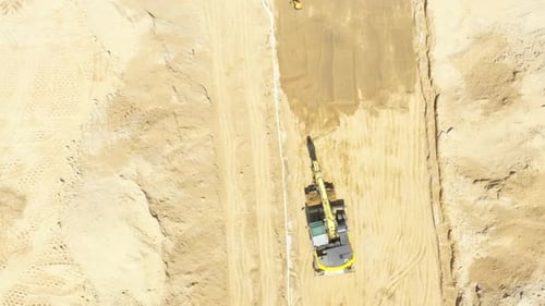 Excavator Working on Construction Site, Aerial View