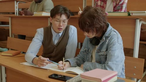 Students Working Together on Assignment in Classroom