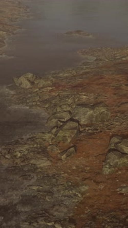 Beautiful View of Foggy Mountains with a Reflection in a Lake