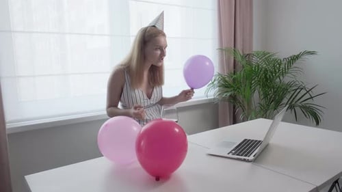 Woman Celebrates Birthday on Video Call at Home