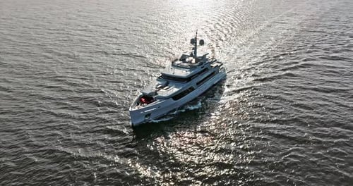 Aerial View Tracking of Beautiful Modern White Super Yacht Lifestyle Luxury Boat Sailboat