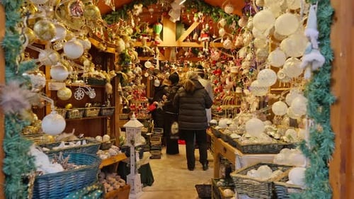 Moving into a traditional European Christmas market stall shop, ornaments filled floor to ceiling