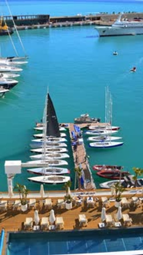Aerial view of boats docked in the Monaco Marina. Vertical