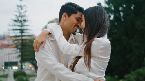 Loving Couple Touching Noses at Urban Place Closeup. Enamoured Pair Embracing Together