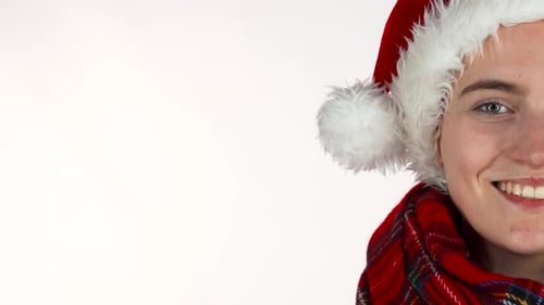 Smiling Woman Wearing Santa Hat Close Up