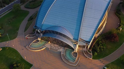 Aerial Top View of a Building with Blue Roof in Modernistic Architecture Style